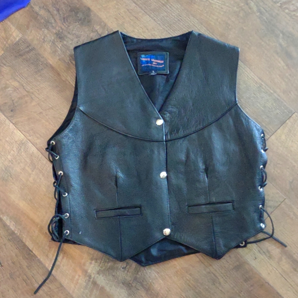 Leather vest ties up the sides
